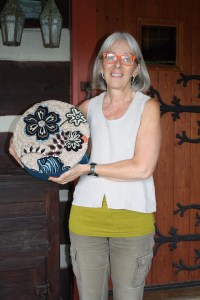 Susan L Feller with mixed media hassock